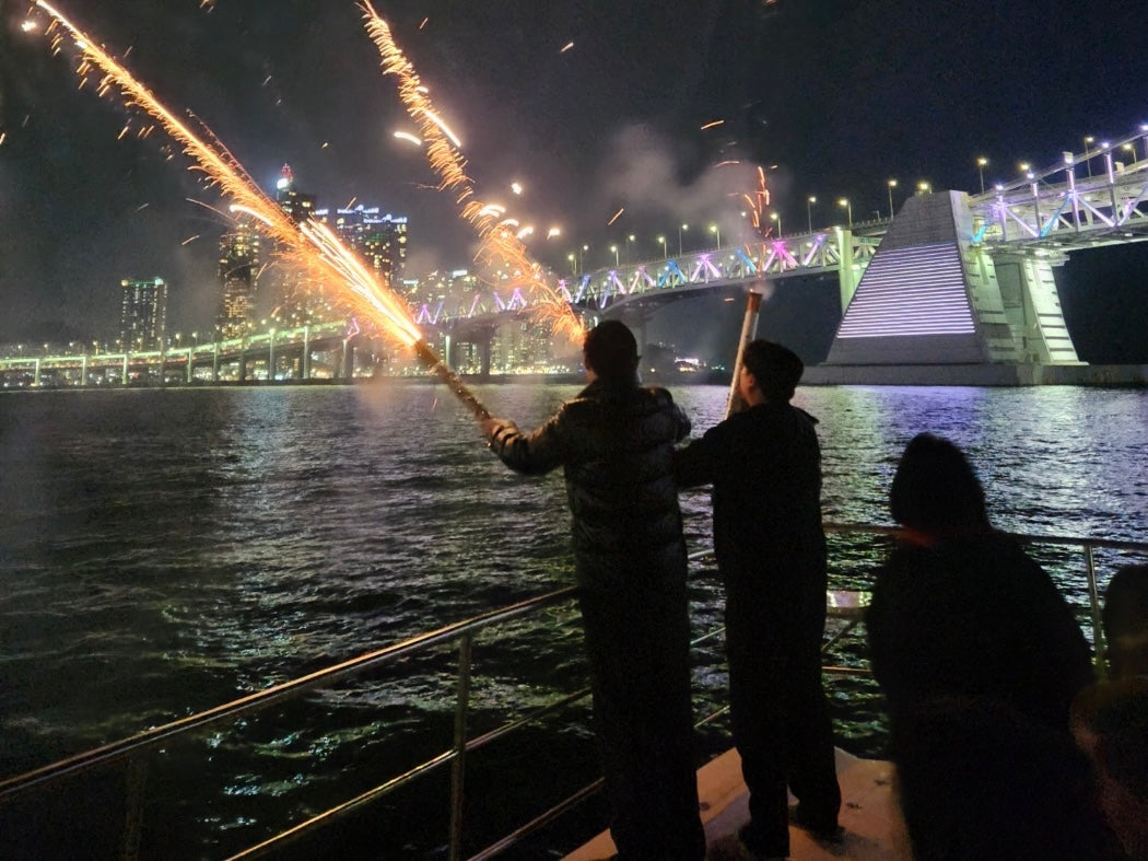 Experience an unforgettable Busan night yacht tour with a front-row view of dazzling fireworks over Gwangalli Beach. Cruise along the coastline as the city lights reflect on the ocean, offering one of the best night views in Korea. This luxury yacht experience is perfect for couples, groups, or anyone looking for top things to do in Busan at night. Enjoy the romance of the sea, the excitement of fireworks, and the beauty of Busan’s skyline — all in one magical evening